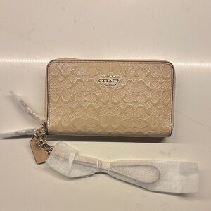 Coach Beige Signature Embossed Zip Wallet
